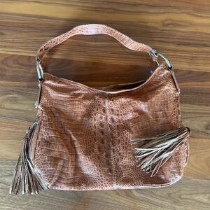 Tan Hobo Bag with Tassel Detail and Slouchy Silhouette